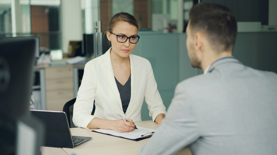 insurance agent talking to client