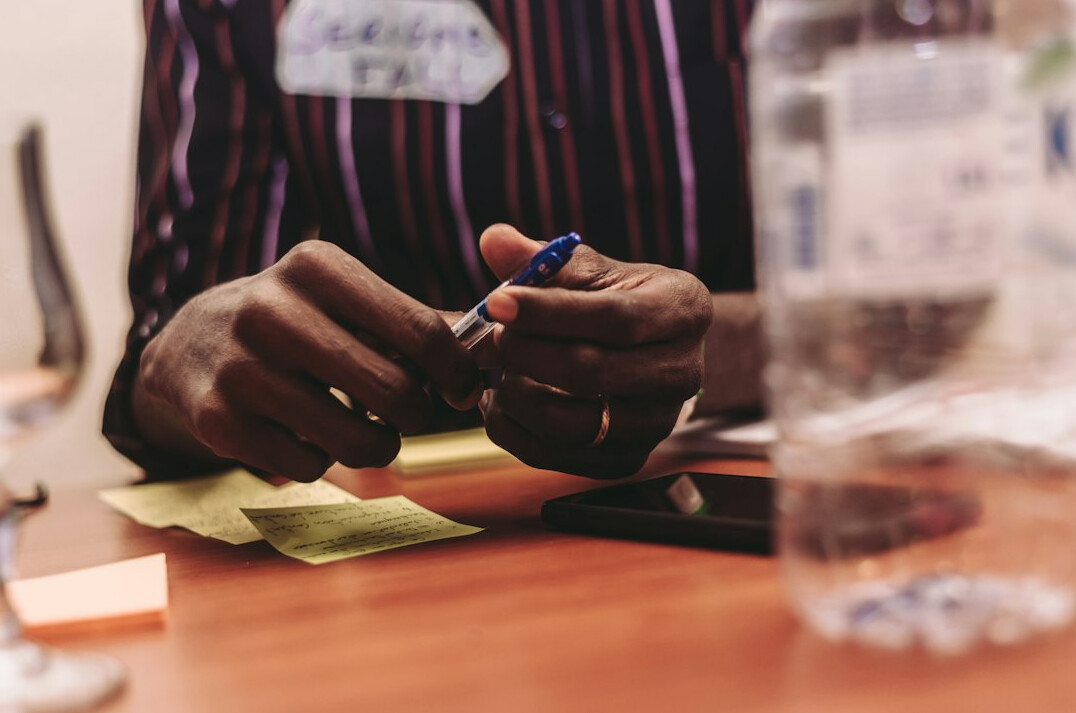 person calculating expenses
